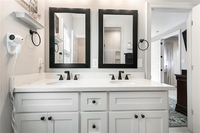 965 Kino St, Diamondhead, MS 39525 - full bath featuring a sink, a healthy amount of sunlight, and a tile shower
