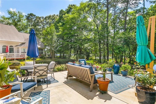 965 Kino St, Diamondhead, MS 39525 - sunroom / solarium with ceiling fan and view of scattered trees