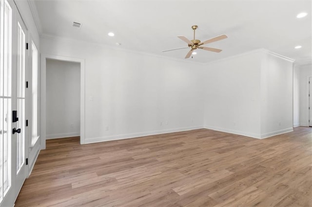 309 W 27th Ave, Covington, LA 70433 - spare room with visible vents, light wood-style flooring, a ceiling fan, and ornamental molding