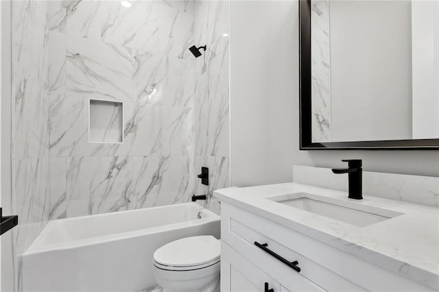 full bath featuring toilet,  shower combination, and vanity