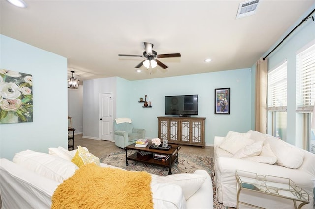 living room with visible vents, baseboards, ceiling fan, and recessed lighting
