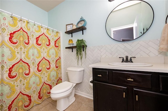 bathroom with tile patterned floors, toilet, a shower with shower curtain, and vanity
