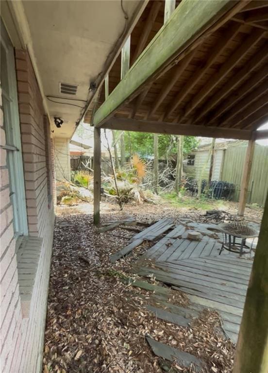 deck with an outbuilding