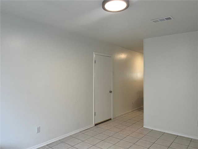 1053 Sandalwood Dr, Harvey, LA 70058 - empty room with baseboards, light tile patterned floors, and visible vents