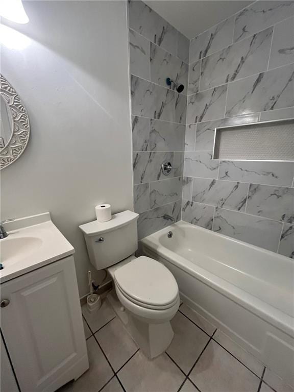 1053 Sandalwood Dr, Harvey, LA 70058 - bathroom featuring shower / bath combination, vanity, toilet, and tile patterned flooring