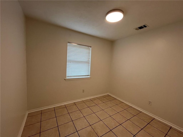 1053 Sandalwood Dr, Harvey, LA 70058 - empty room featuring light tile patterned flooring, baseboards, and visible vents