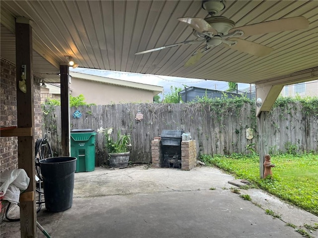 1053 Sandalwood Dr, Harvey, LA 70058 - view of patio with a ceiling fan and fence