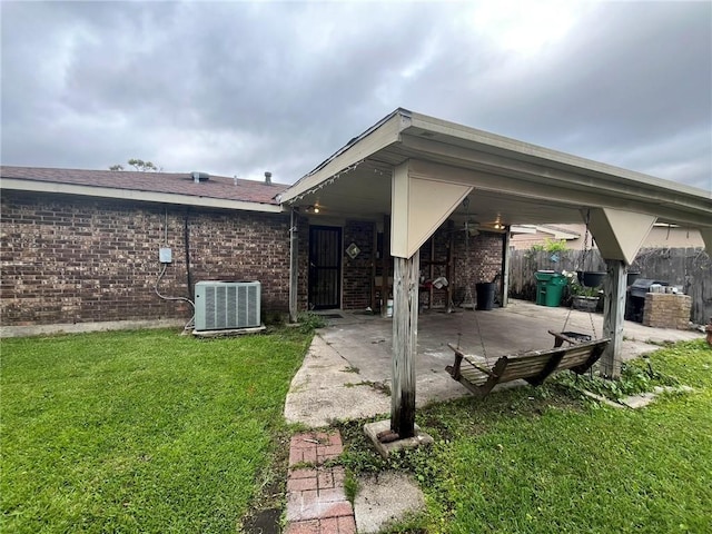 1053 Sandalwood Dr, Harvey, LA 70058 - view of patio / terrace with central AC unit and fence