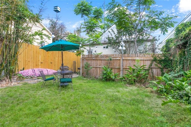 view of yard featuring fence
