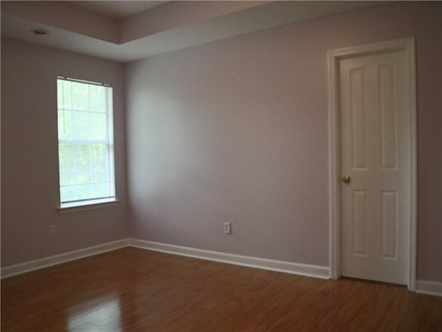 20102 Garland St, Covington, LA 70435 - spare room featuring wood finished floors and baseboards