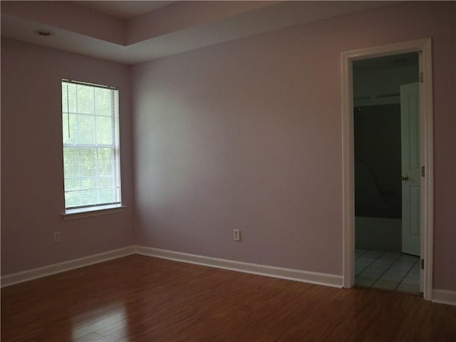 20102 Garland St, Covington, LA 70435 - empty room with wood finished floors and baseboards