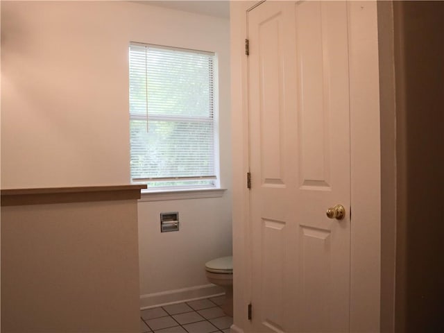 20102 Garland St, Covington, LA 70435 - bathroom with toilet, baseboards, and tile patterned floors