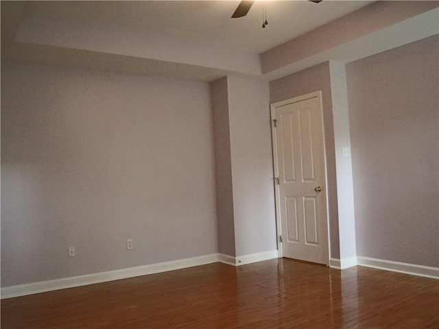 20102 Garland St, Covington, LA 70435 - empty room featuring ceiling fan, wood finished floors, and baseboards