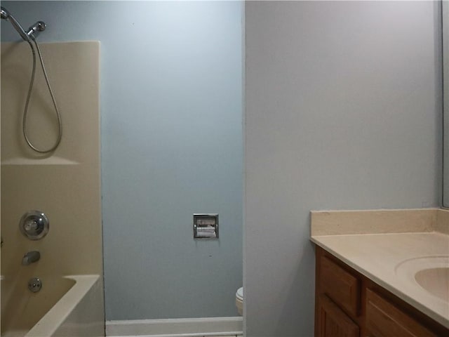20102 Garland St, Covington, LA 70435 - full bath featuring vanity, toilet, tub / shower combination, and baseboards