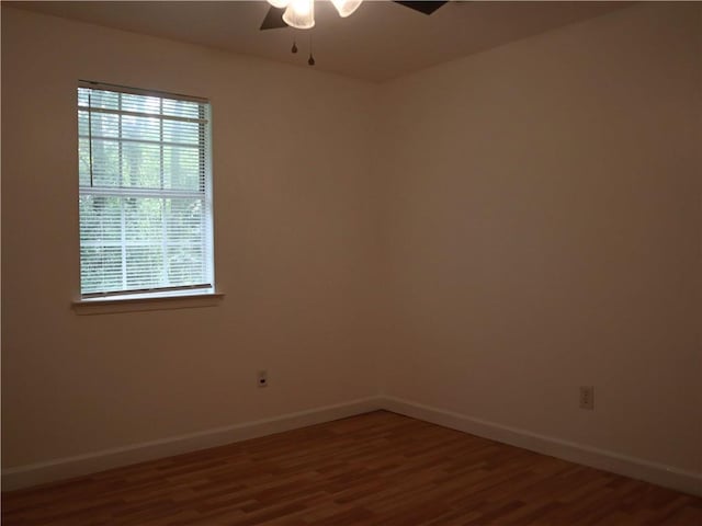 20102 Garland St, Covington, LA 70435 - spare room featuring a ceiling fan, wood finished floors, baseboards, and plenty of natural light