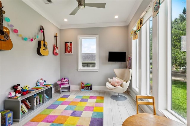 rec room featuring wood finished floors, baseboards, ceiling fan, and recessed lighting