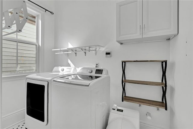 2540 Saint Ann St, New Orleans, LA 70119 - washroom with cabinet space and washer and dryer