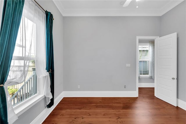 2540 Saint Ann St, New Orleans, LA 70119 - spare room with wood finished floors, ornamental molding, baseboards, and ceiling fan
