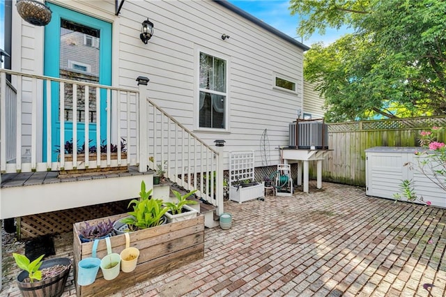 2540 Saint Ann St, New Orleans, LA 70119 - view of patio / terrace featuring a jacuzzi and central AC
