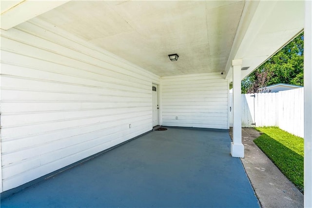 view of patio featuring fence