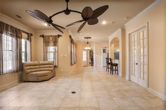 building lobby featuring ornamental molding and recessed lighting