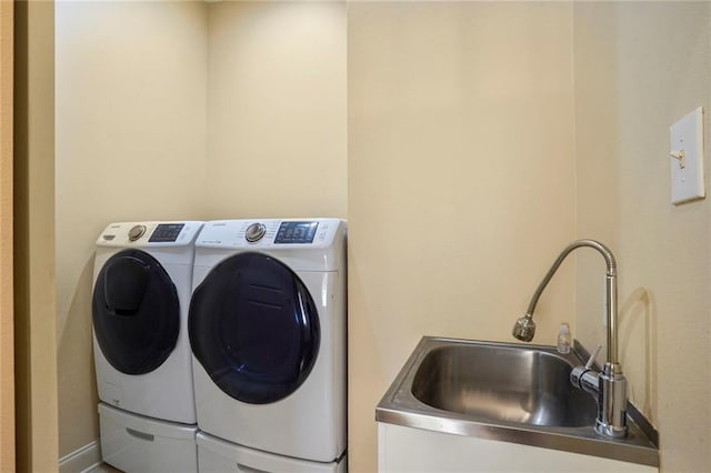 717 Tunica Bnd, Covington, LA 70433 - washroom with washing machine and clothes dryer