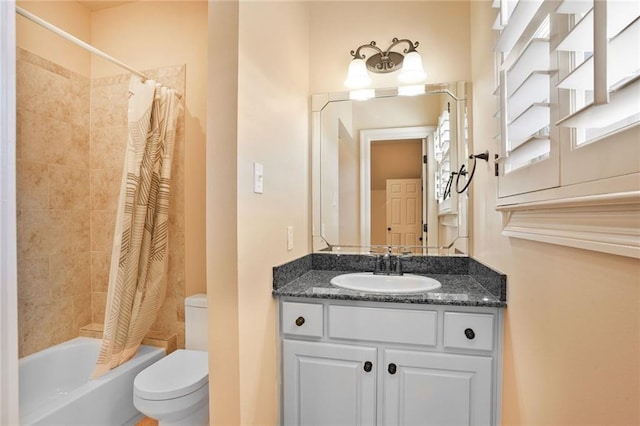 717 Tunica Bnd, Covington, LA 70433 - bathroom featuring toilet, shower / bath combo, and vanity