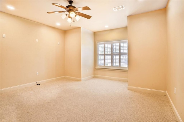 717 Tunica Bnd, Covington, LA 70433 - spare room featuring ceiling fan, light colored carpet, recessed lighting, and baseboards