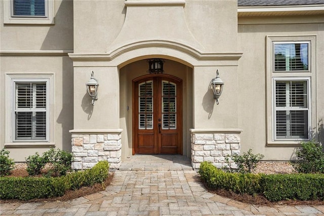 717 Tunica Bnd, Covington, LA 70433 - property entrance featuring stone siding and stucco siding