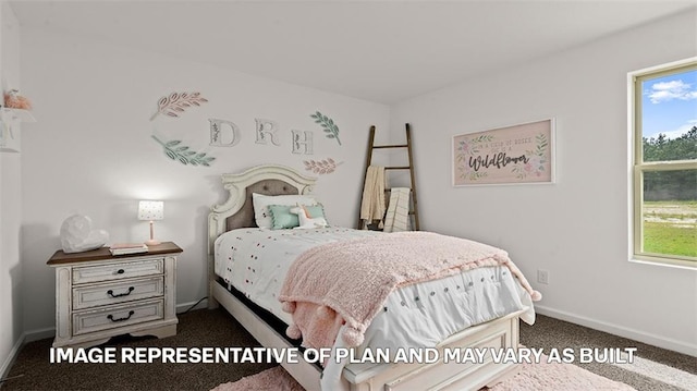 carpeted bedroom with baseboards