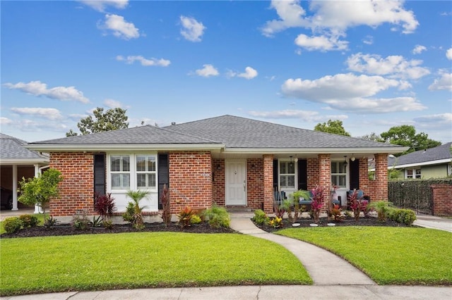 3316 N Labarre Rd, Metairie, LA 70002 - ranch-style house with a porch and brick siding