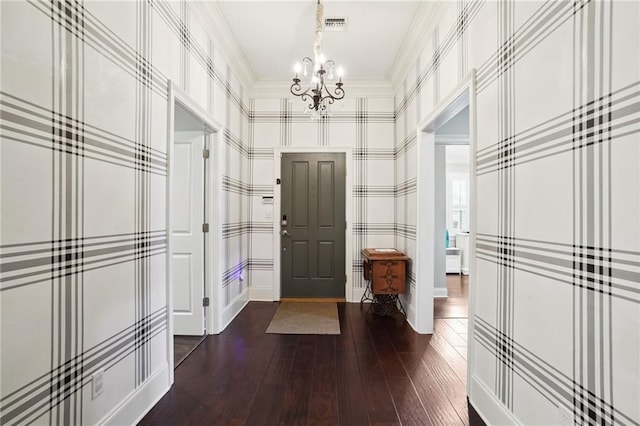 3316 N Labarre Rd, Metairie, LA 70002 - foyer entrance featuring a chandelier and dark wood-style flooring