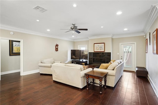 3316 N Labarre Rd, Metairie, LA 70002 - living area featuring plenty of natural light, crown molding, dark wood finished floors, baseboards, and recessed lighting