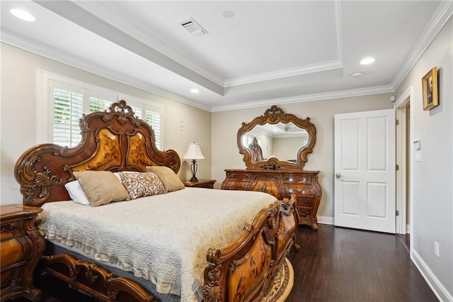 3316 N Labarre Rd, Metairie, LA 70002 - bedroom featuring dark wood-style floors, recessed lighting, baseboards, a tray ceiling, and ornamental molding