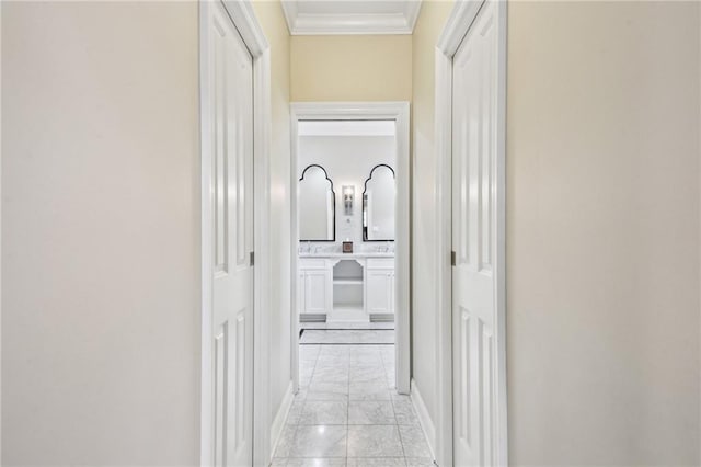 3316 N Labarre Rd, Metairie, LA 70002 - corridor featuring ornamental molding, light marble finish floors, and baseboards