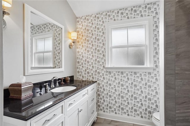 3316 N Labarre Rd, Metairie, LA 70002 - bathroom featuring vanity, baseboards, and toilet