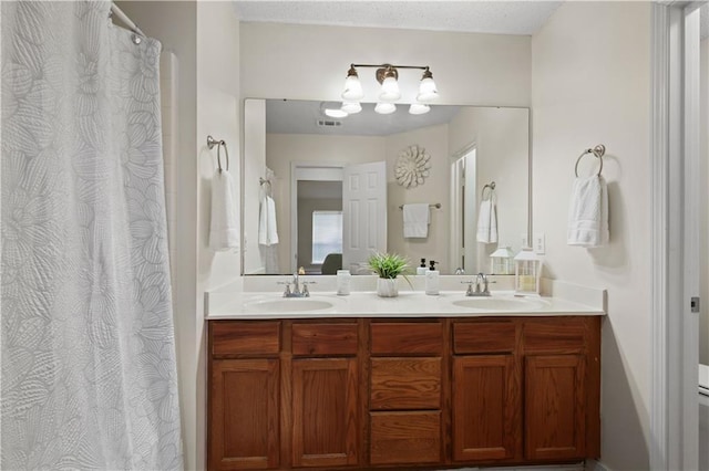 6705 Alisa Dr, Slidell, LA 70460 - full bath featuring double vanity and curtained shower