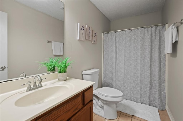6705 Alisa Dr, Slidell, LA 70460 - bathroom with tile patterned flooring, toilet, vanity, a textured ceiling, and a shower with shower curtain