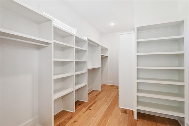 605 Northwoods Dr, Abita Springs, LA 70420 - walk in closet featuring light wood-style floors