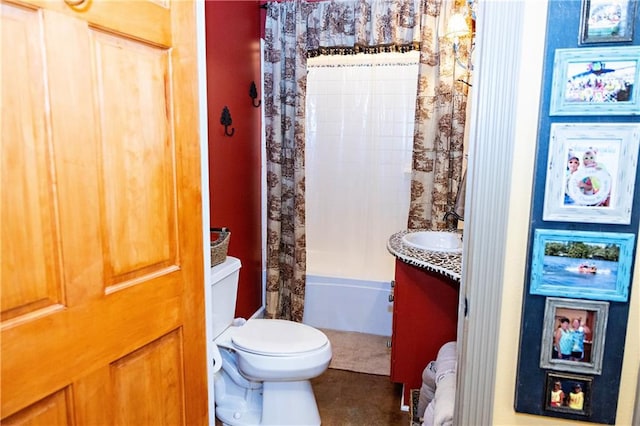 full bathroom featuring a sink, toilet, and shower / tub combo