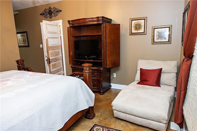 carpeted bedroom with baseboards
