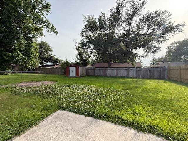 1535 Natchez Ln, La Place, LA 70068 - view of yard with a storage shed and an outbuilding