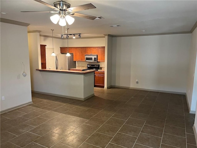 kitchen featuring stainless steel appliances, crown molding, brown cabinets, baseboards, and a peninsula