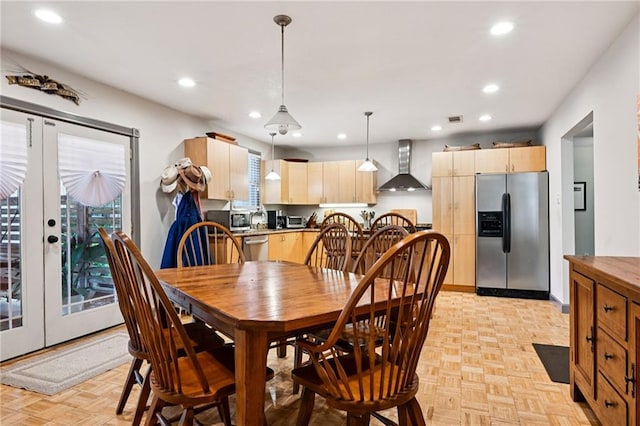 389 Hickory Dr, Slidell, LA 70458 - dining space with recessed lighting and french doors