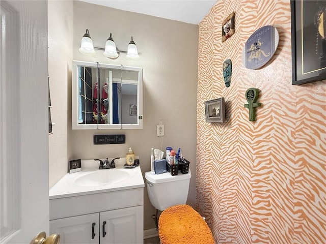 58207 Jefferson Ave, Slidell, LA 70460 - bathroom featuring toilet and vanity