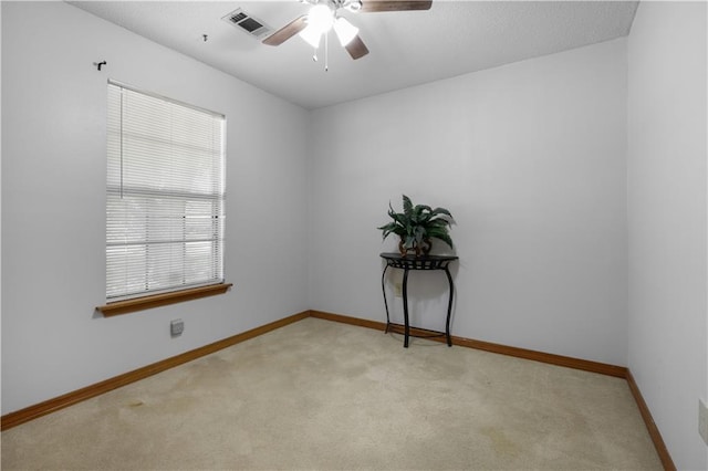 104 Maple Ridge Dr, Slidell, LA 70460 - spare room with light colored carpet, a ceiling fan, and baseboards