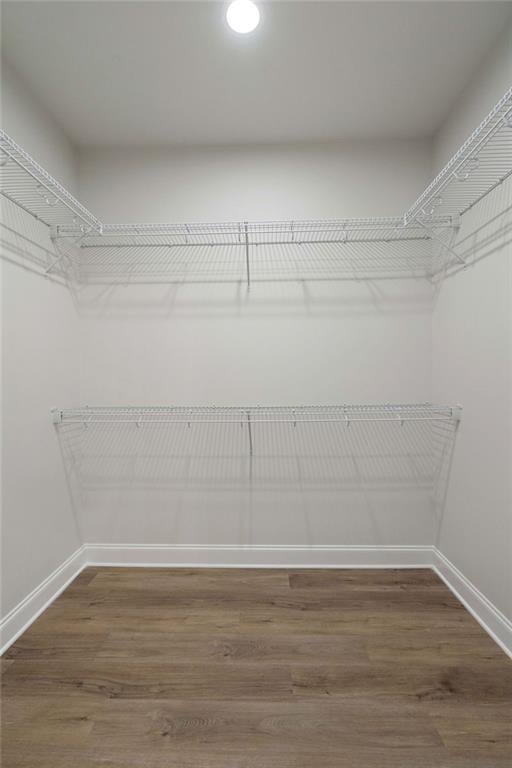 2441 Dupard St, Mandeville, LA 70448 - spacious closet with wood finished floors