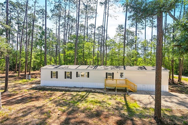 25259 Bunker St, Abita Springs, LA 70420 - manufactured / mobile home with a wooden deck