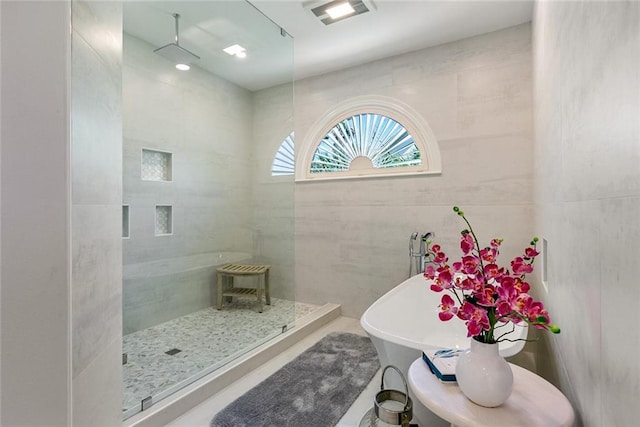 228 Marlin Dr, Slidell, LA 70461 - full bath featuring tiled shower and a freestanding tub