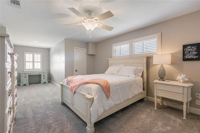 228 Marlin Dr, Slidell, LA 70461 - bedroom featuring carpet flooring, multiple windows, baseboards, and a ceiling fan